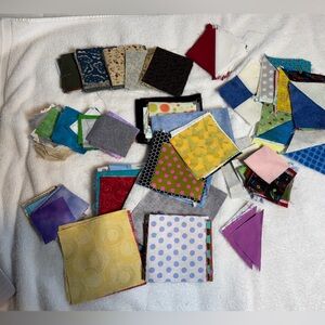 Pre-cut Quilt Squares. Collection of fabric patterns for next quilting project.